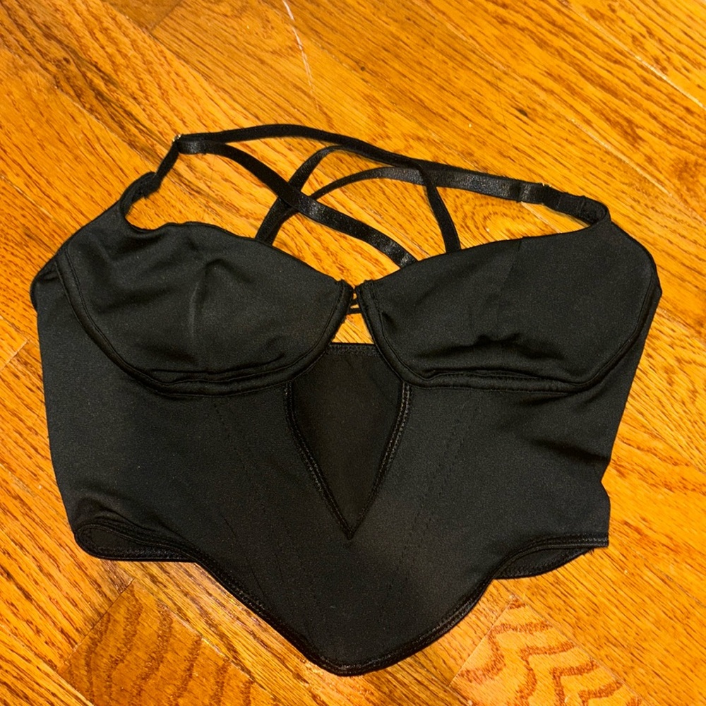 Black going out top